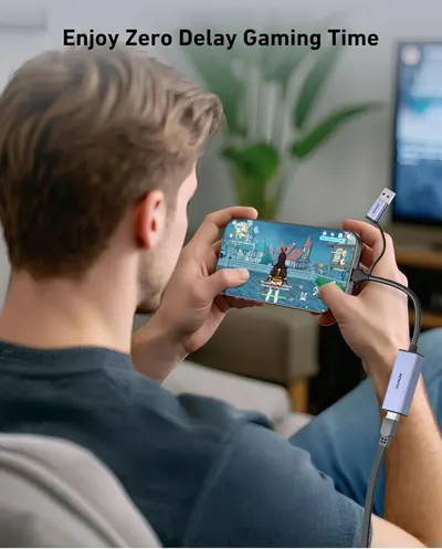 Communicates that the product (USB adapter/cable) enables lag-free, zero-delay gaming on mobile devices, reassuring gamers of smooth performance.