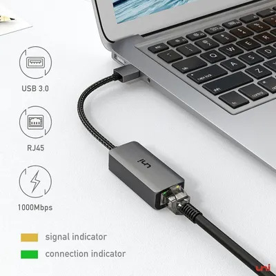 This image breaks down the physical components and technical specifications of the USB to Ethernet adapter, showing shoppers exactly what ports and features the product includes and how they…