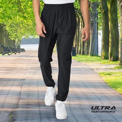 Demonstrates the product in a real-world outdoor setting to help shoppers visualize wearing the pants during active lifestyle activities like walking or jogging.
