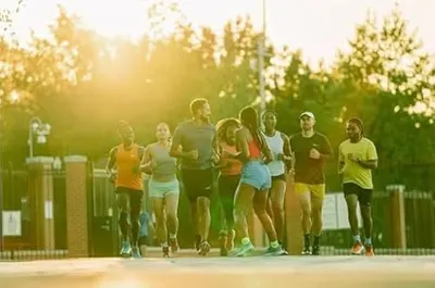 Demonstrates the product in a real-world active lifestyle context, showing people using the product during outdoor exercise to help shoppers visualize themselves using it.