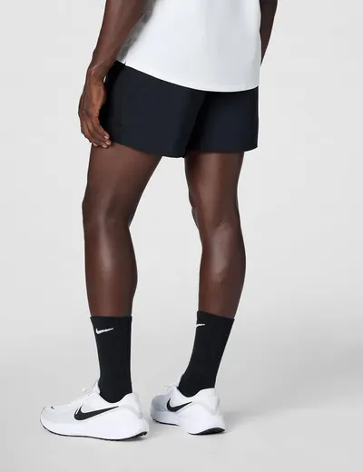 Displays the athletic shorts on a model in a clean, catalog-style format to show fit, length, and overall appearance without distractions.