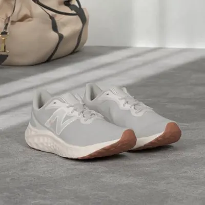 Shows the product in a natural lifestyle setting to help shoppers visualize the shoes in everyday use.