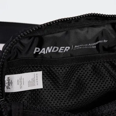Shows a close-up detail of the product's branding, zipper, and material quality to help shoppers understand the product's construction and brand identity.