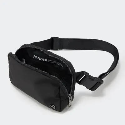 Provides a clean, catalog-style view of the black fanny pack product showing its design, zipper, adjustable strap, and brand logo without distractions.