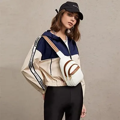 Demonstrates the product worn in a real-world fashion context to help shoppers visualize the style and fit on a person.