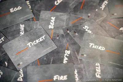Shows all the cards and components included in the game package, helping shoppers understand what they receive when purchasing.