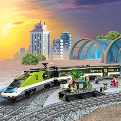 Shows the complete contents of the LEGO train set, including the train, platform, minifigures, tracks, and accessories to help shoppers understand everything included in the purchase.