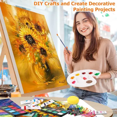 Shows all the painting supplies and accessories included with the product to demonstrate the complete kit a customer receives for DIY art projects.