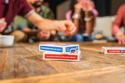 Demonstrates the product in a real-world social setting to show how it brings people together for entertainment and family bonding.