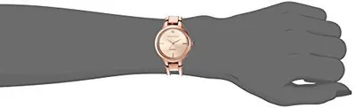 Demonstrates the actual size of the watch on a human wrist to help shoppers visualize scale and fit before purchasing.