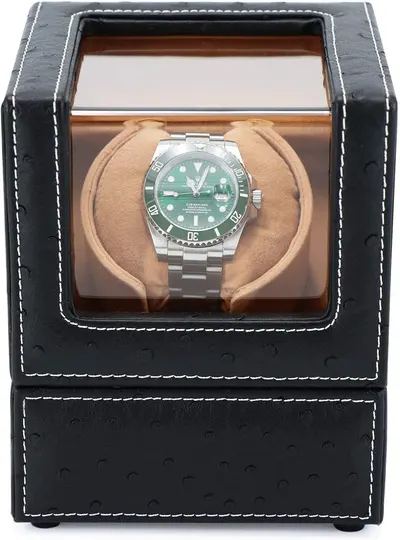 Shows the watch winder product with the watch inside in a clean, catalog-style presentation to help shoppers see exactly what they're purchasing.