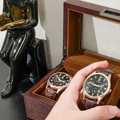 Demonstrates what the customer receives with their purchase, showing the premium wooden storage box with glass top and the watches it can hold, emphasizing the complete package and value.