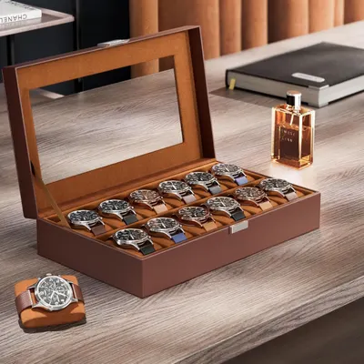 Showcases the watch storage box in an elegant, real-world setting to convey sophistication and premium quality, helping shoppers visualize the product in their own home or office environment.