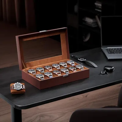 Showcases the watch collection storage box in an elegant office/home setting to convey sophistication and premium quality, helping shoppers visualize the product in their own lifestyle context.