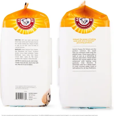 Communicates that these gentle puppy wipes are enhanced with Arm & Hammer baking soda particles for deep cleaning and odor elimination, reassuring pet owners of effective cleaning between baths.