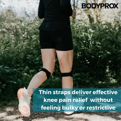 Communicates that the knee straps provide effective pain relief while remaining comfortable and unobtrusive during physical activity.