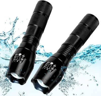 Demonstrates the flashlights waterproof capability by showing them surrounded by water splashes, reassuring shoppers they can use the product in wet conditions or outdoor environments.