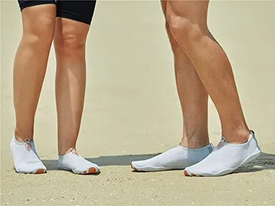 Demonstrates the product being worn in a natural outdoor setting to help shoppers visualize the shoes in everyday use.