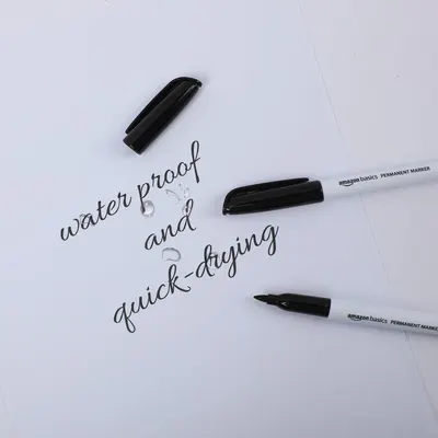Communicates two key product benefits - waterproof ink and quick-drying properties - to reassure shoppers the markers are practical and reliable for various uses.