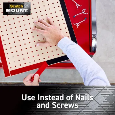 Demonstrates that the mounting tape provides an easy, tool-free alternative to traditional nails and screws for hanging items.