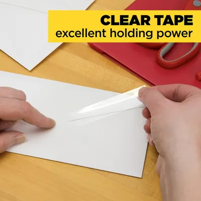 Demonstrates the clear tape's excellent holding power through a hands-on demonstration, reassuring shoppers of its strong adhesive performance.