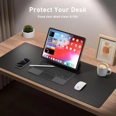 Communicates that the desk mat protects the desk surface while keeping the workspace clean and organized, appealing to shoppers looking for functional desk accessories.