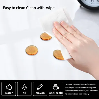 Demonstrates that the product surface is easy to clean by simply wiping, reassuring shoppers about low-maintenance care and stain resistance.