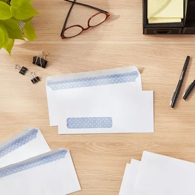 Demonstrates the product in a real-world office setting to help shoppers visualize the envelopes in their everyday work environment.
