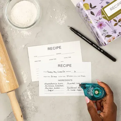 Shows all the items included with the product to help shoppers understand what they will receive in the package, emphasizing the complete recipe card kit with writing tools.