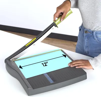 Communicates the maximum cutting width of the paper trimmer to help shoppers understand what size materials it can accommodate. Highlights the 12-inch cutting capacity as a key benefit for shoppers…