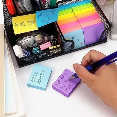 Demonstrates the product in a real-world office or home workspace setting, showing how the sticky notes and organizer fit naturally into everyday use.