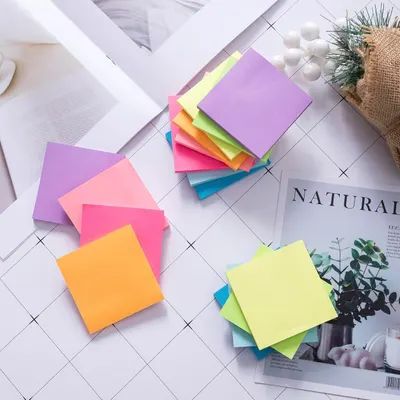 Displays the product in a clean, catalog-style format to show the variety of vibrant colors available in the sticky note set.