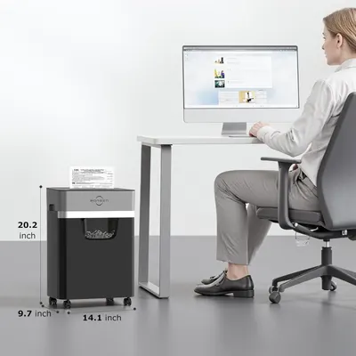 Communicates the physical dimensions of the paper shredder to help shoppers understand its compact footprint and ensure it fits their office space. Demonstrates that the shredder is compact and fits…