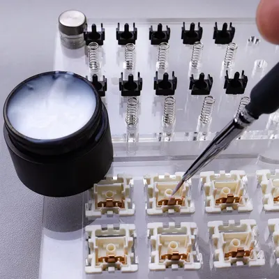 Shows all the components and tools included in the keyboard customization kit, helping shoppers understand the complete package they will receive for building or modifying mechanical keyboards.