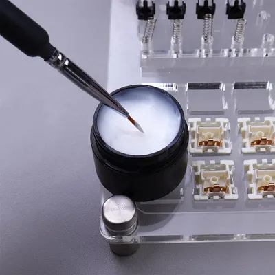 Demonstrates how to properly apply the product using the included brush tool, showing the correct technique for use.