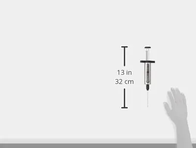 Communicates the exact physical size of the product (13 inches / 32 cm) using dimension arrows and a hand for scale reference, helping shoppers understand how large the product is.