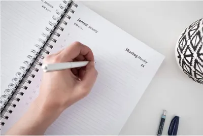 Shows the product being used in a natural, everyday setting to help shoppers visualize how the planner fits into their daily routine.