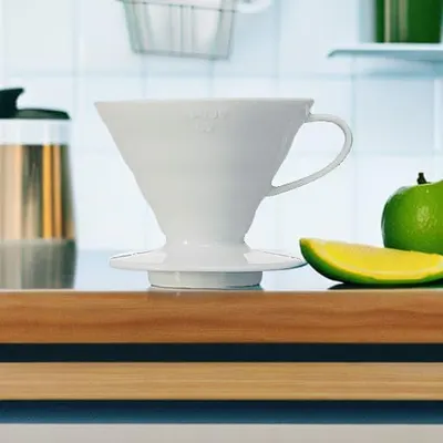 Showcases the product in a real-world kitchen environment to help shoppers visualize how it fits into their daily routine and home aesthetic.