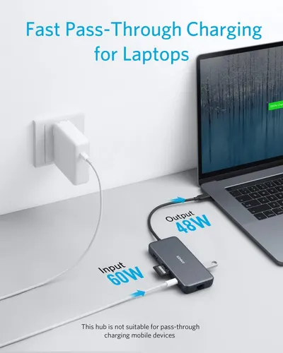 Communicates the product's fast pass-through charging capability with specific wattage metrics to reassure shoppers that it can efficiently power laptops while maintaining high performance.…
