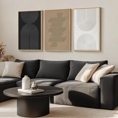Displays the wall art set in a living room setting to demonstrate how the product fits into modern home decor and helps shoppers envision it in their space.
