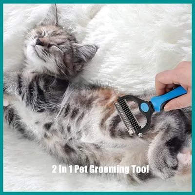 Shows the product being used on a cat in a real home setting to help shoppers visualize the grooming experience with feline pets, with minimal text overlay.