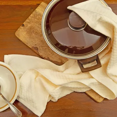 Demonstrates the product in use within a kitchen environment to show practical application and aesthetic appeal.