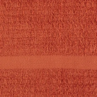 Provides a close-up view of the towel's texture and weave pattern on a white background to help shoppers assess quality.