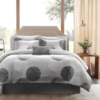 Shows the complete bedding set styled in a real bedroom environment to help shoppers visualize how the product looks in use.