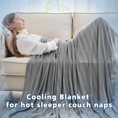Demonstrates the cooling blanket's versatility for hot sleepers, couch naps, and relaxation scenarios.