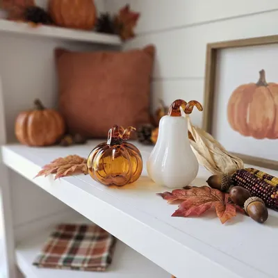Shows the product styled in a real-world fall home setting with seasonal decor to help shoppers visualize how it fits into their autumn decorating.