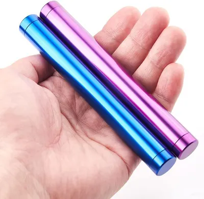 Uses a hand as a reference object to demonstrate the small, portable size of the product, reassuring shoppers it is easy to carry.
