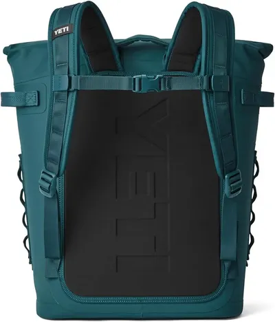 Shows the back panel and strap system of the backpack in a clean white background product shot.
