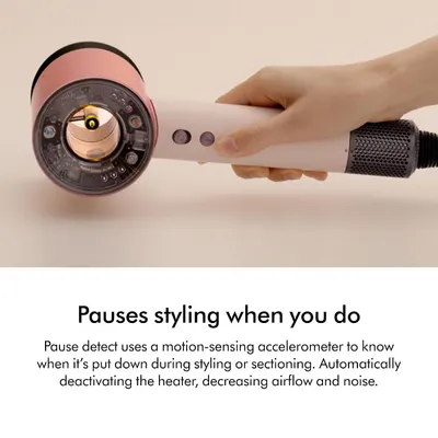 Highlights the motion-sensing pause feature that automatically deactivates the heater and reduces airflow when the dryer is put down, improving convenience…