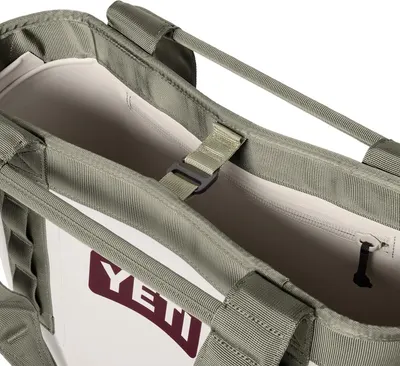 Displays a close-up detail of the bag's interior sleeve feature on a clean white background with no text or graphics.